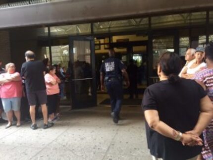  A deputy enters the jail lobby as paramedics inside prepare to transport the man to...