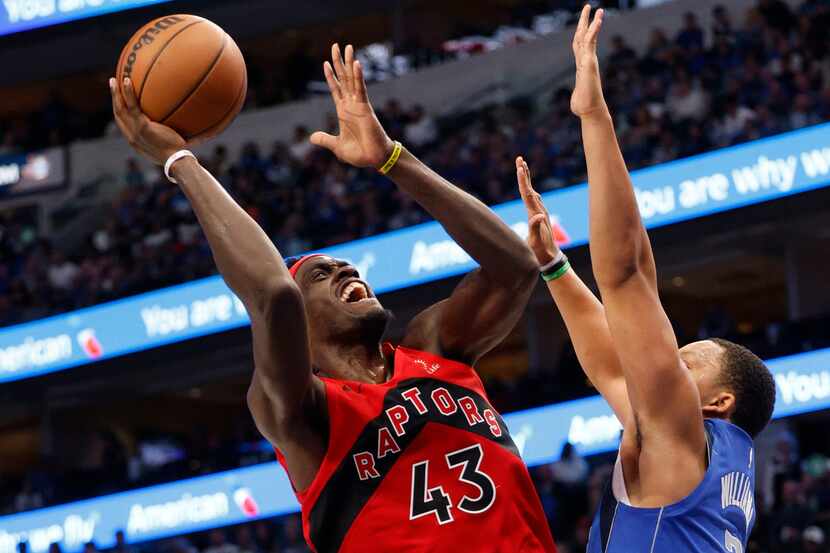 Toronto Raptors forward Pascal Siakam (43) shoots over Dallas Mavericks forward Grant...