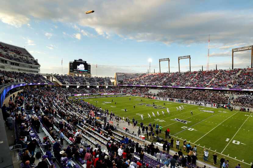 The Goodyear blimp hovers near Amon G. Carter Stadium in Fort Worth as the Texas Tech Red...