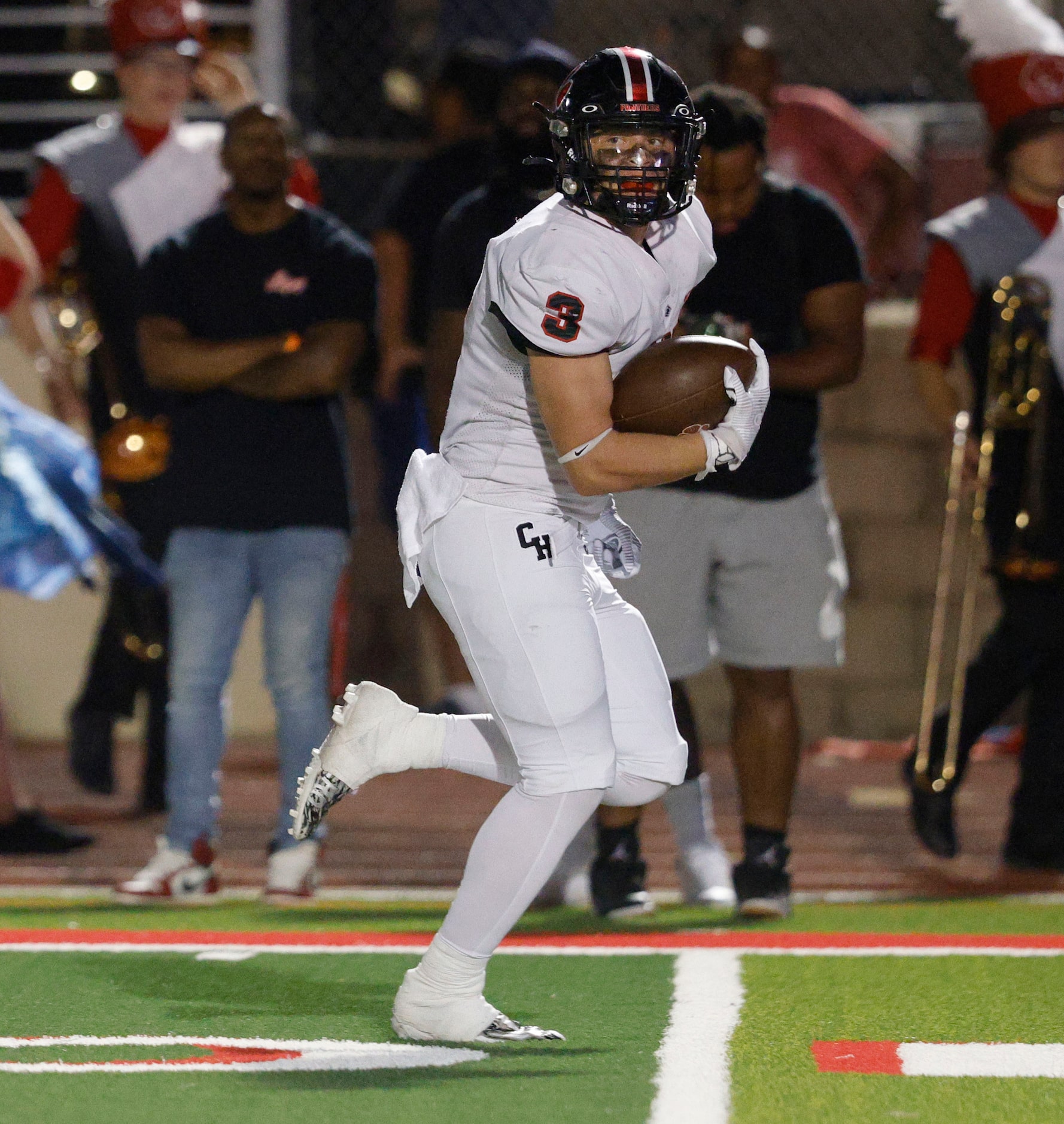 Colleyville Heritage's Ryan Keleher (3) runs into the end zone for a touchdown during the...