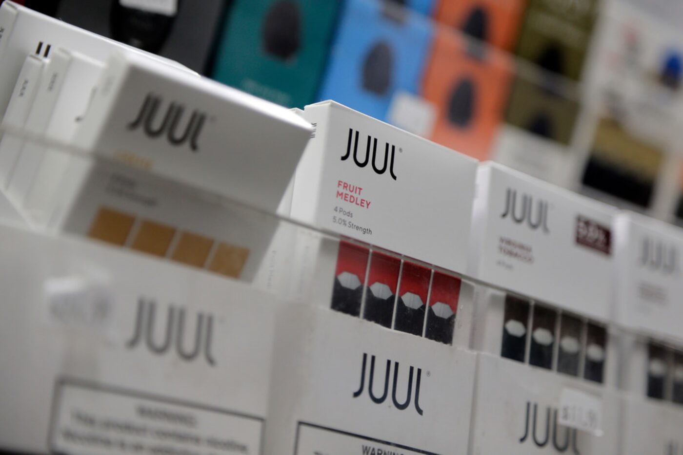 Texas buyers of vape products and e-cigarettes like these Juul products displayed at a New...