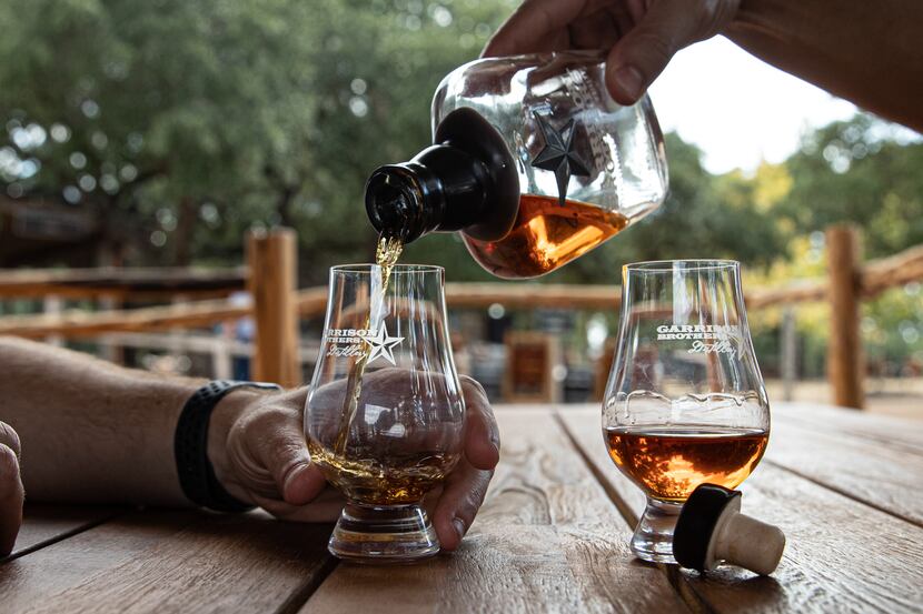 Whiskey is poured at The Garrison Brothers Distillery in Hye, Texas.