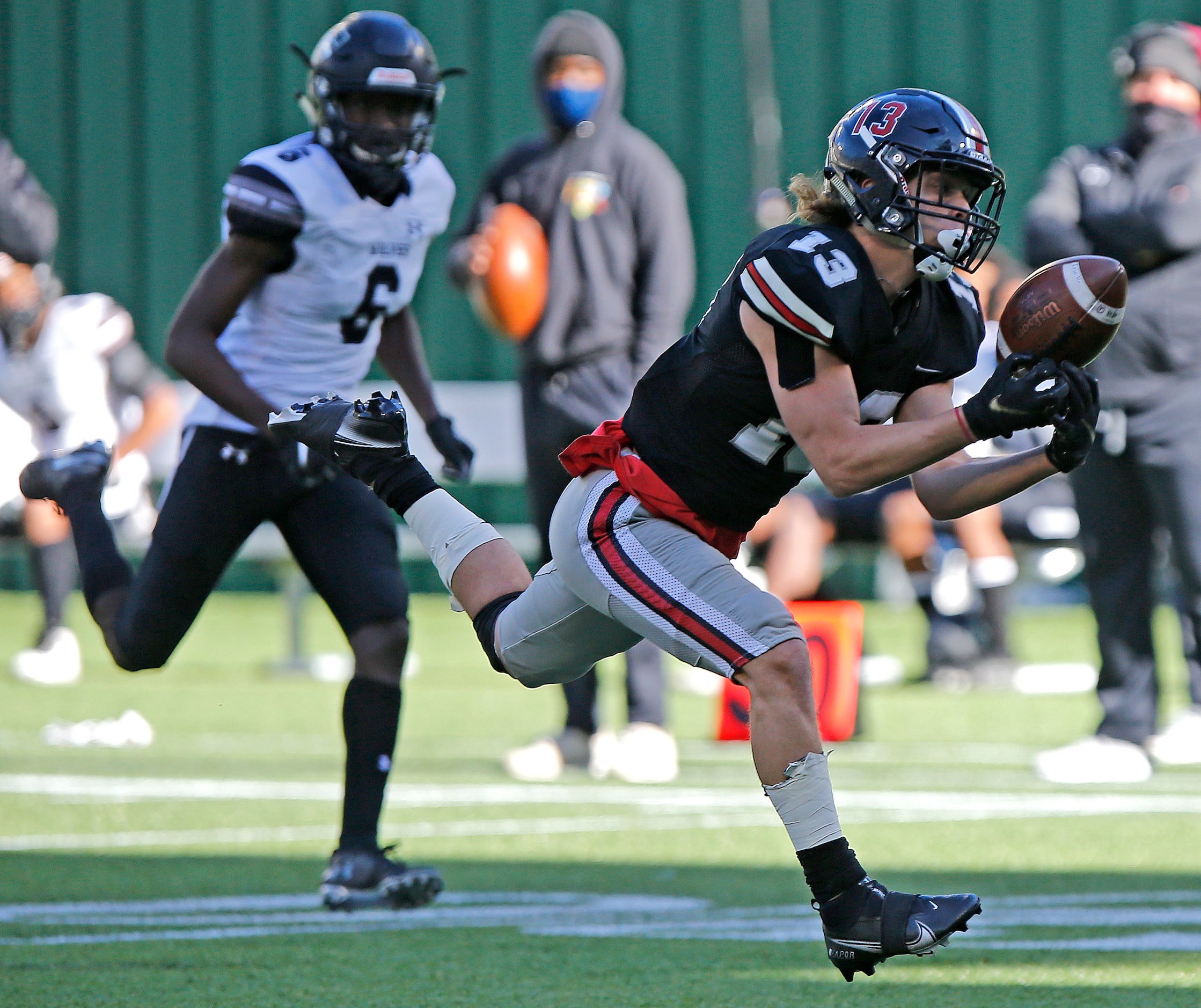 Lovejoy High School wide receiver Luke Mayfield (13) catches a pass to set up a score just...