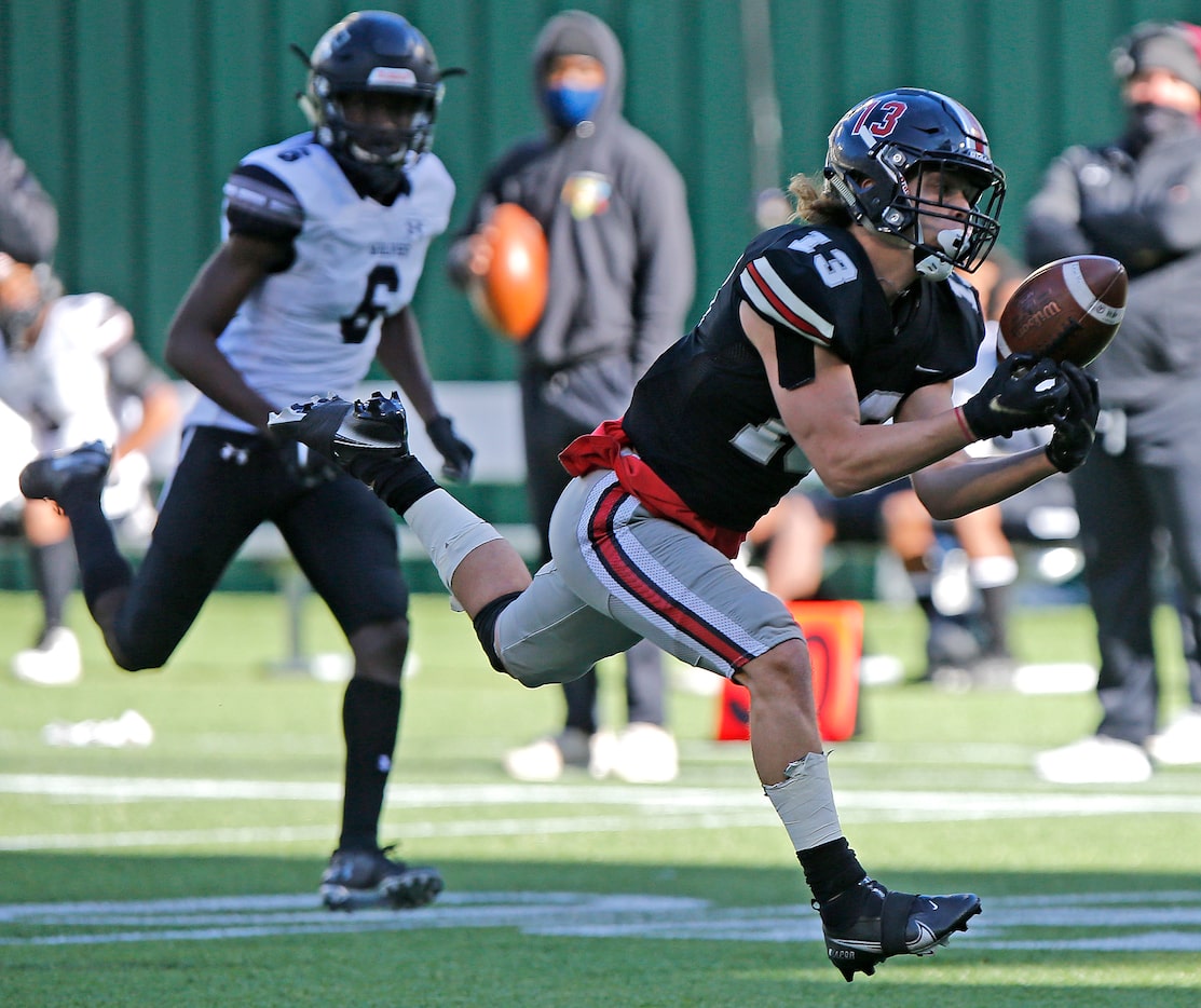 Lovejoy High School wide receiver Luke Mayfield (13) catches a pass to set up a score just...