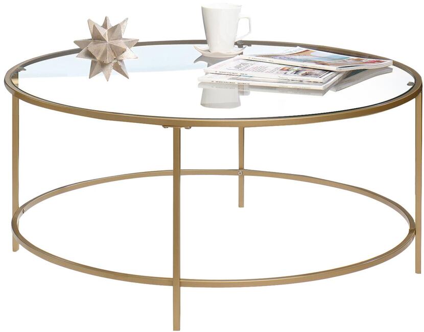 
A clear coffee table, such as the House of Hampton table ($113, allmodern.com), keeps the...