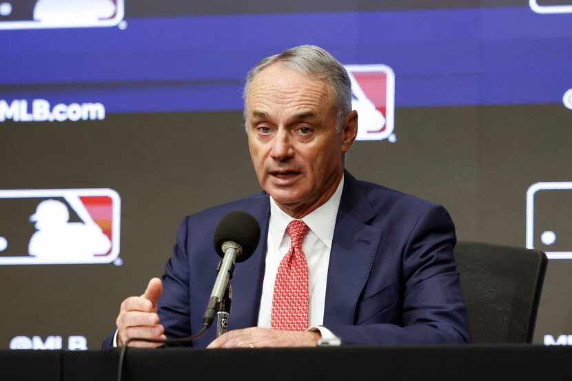 Major League Baseball commissioner Rob Manfred speaks during a news conference at Globe Life...