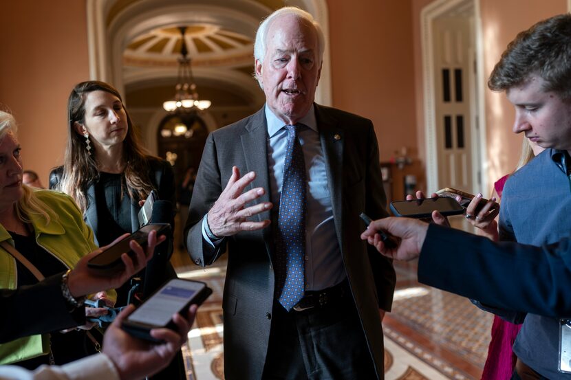 Sen. John Cornyn, R-Texas, speaks to reporters as Senate Republicans head to a closed-door...