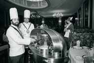 Chefs Ralph Sanchez and Lee Davis, of Lawry's The Prime Rib, slice meat in December 1983....