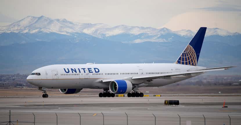 FILE - A United Airlines jetliner taxis to a runway for take off from Denver International...