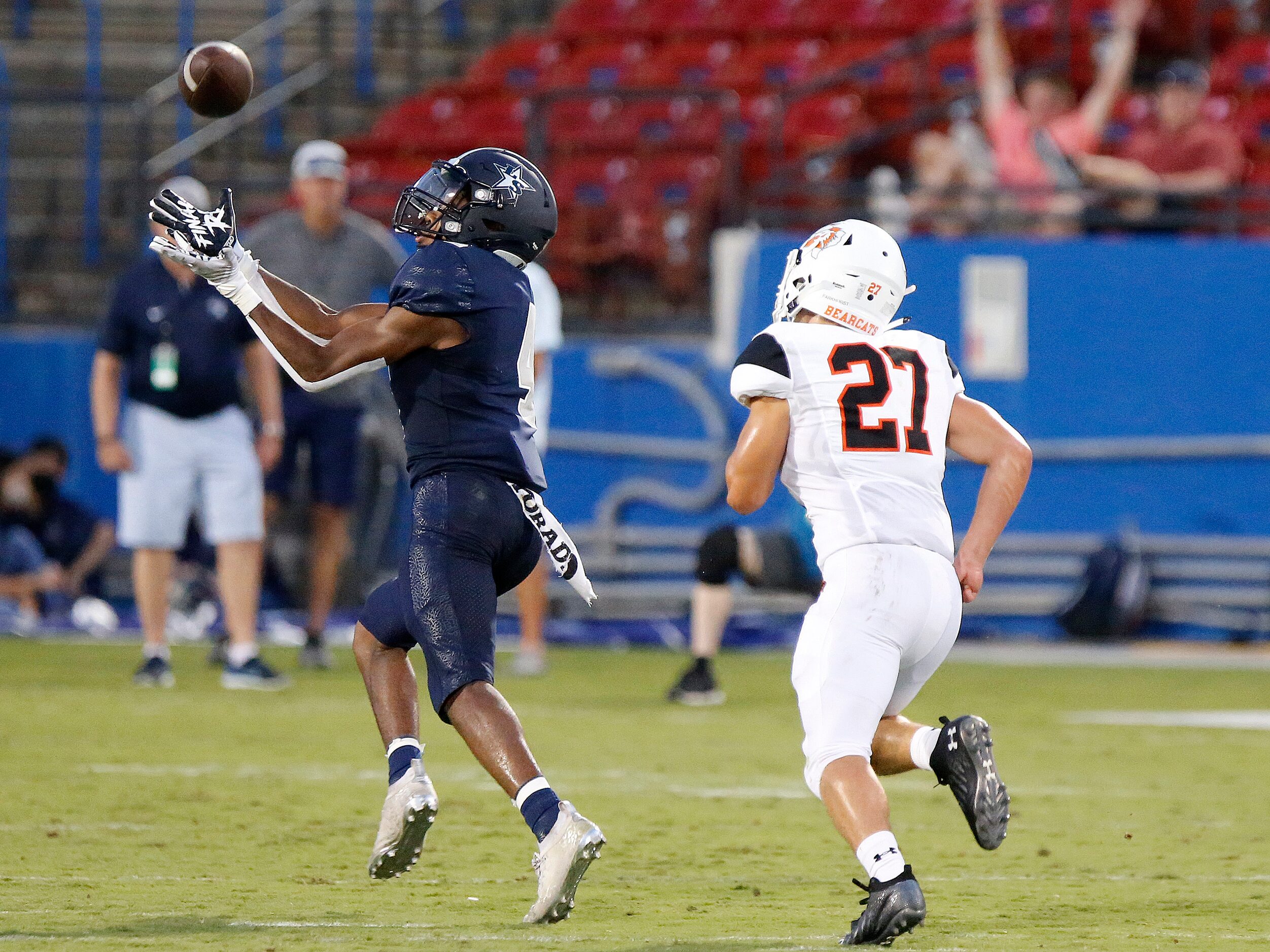 Lone Star High School wide receiver Jaylon Braxton (4) gets behind Aledo High School...