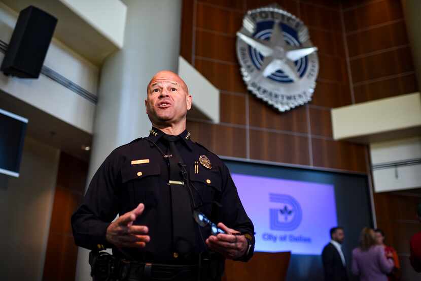 Dallas Police Department Chief, Eddie Garcia, takes questions from reporters during a press...
