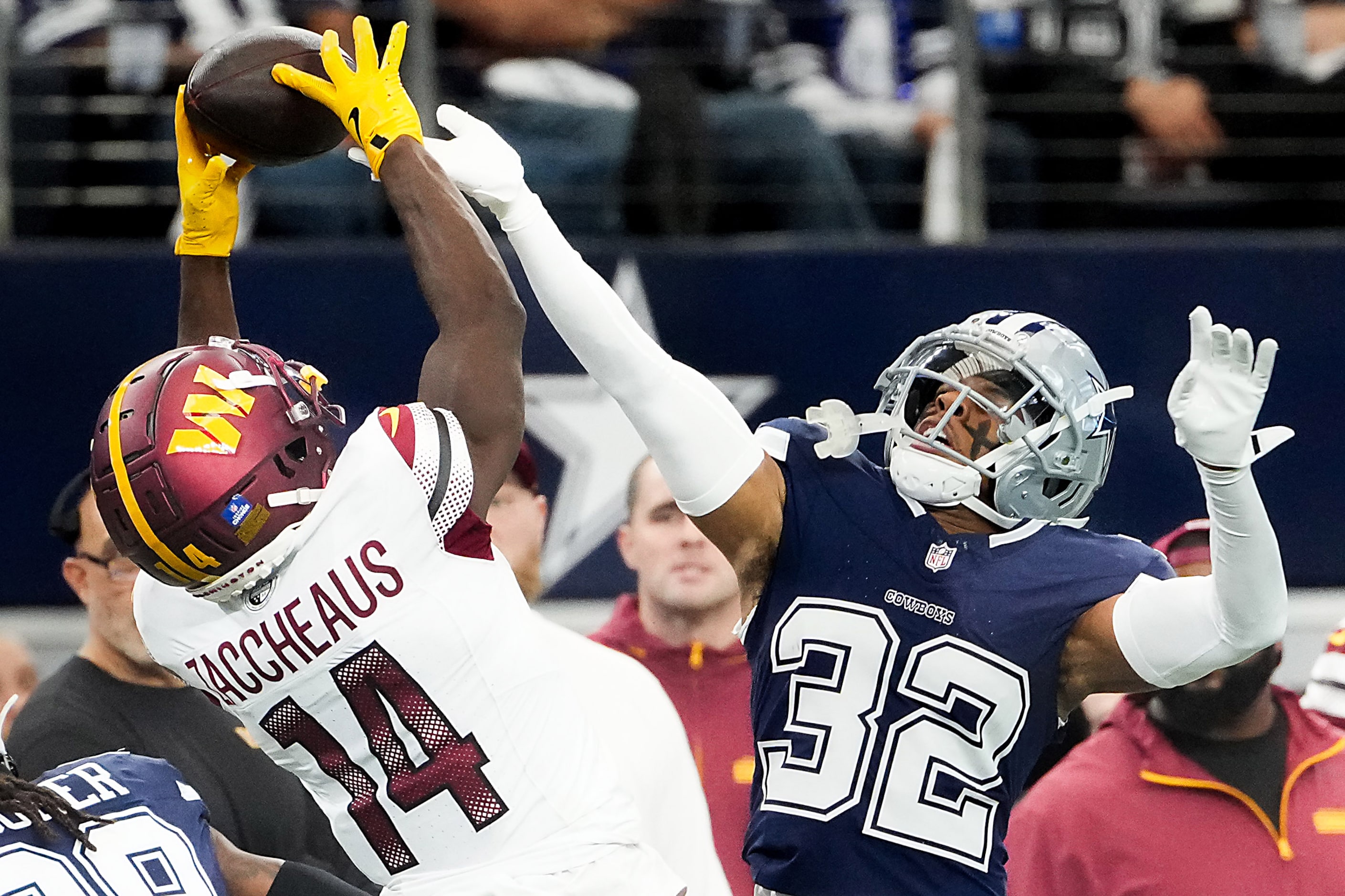 Dallas Cowboys cornerback Troy Pride Jr. (32) breaks up a pass intended for Washington...