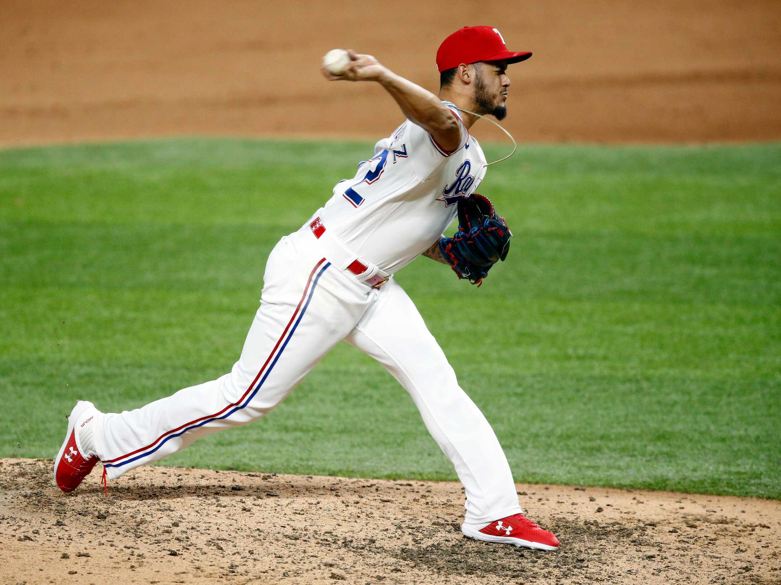 Texas Rangers relief pitcher Jonathan Hernandez (72) throws against the Seattle Mariners in...