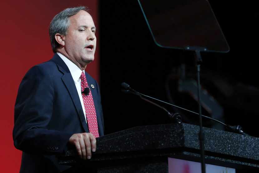 Texas Attorney General Ken Paxton speaks to the crowd during the 2016 Texas Republican...
