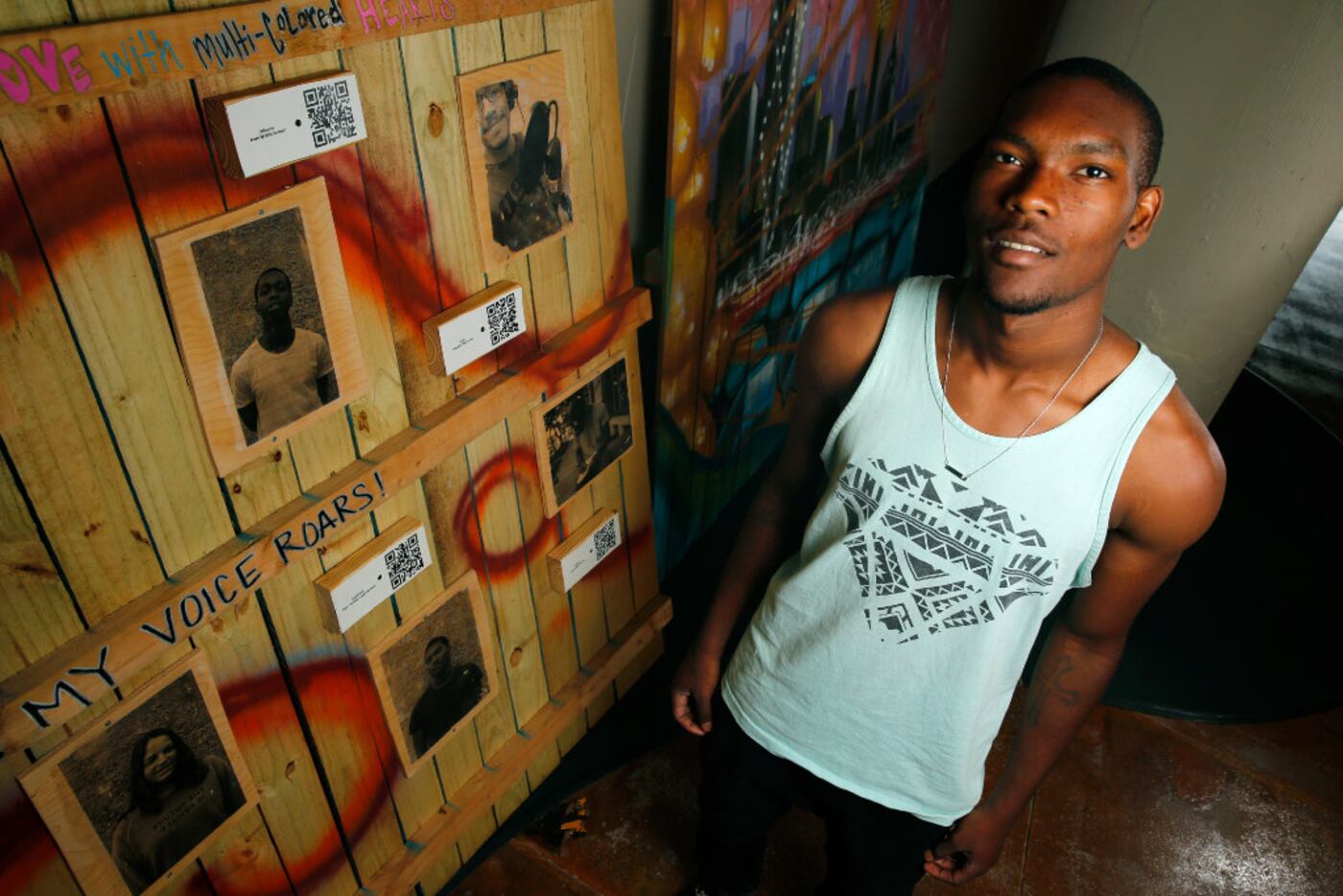 Vertiz Wood, 19, read his poetry for a Big Thought mural in Dallas on June 16. 