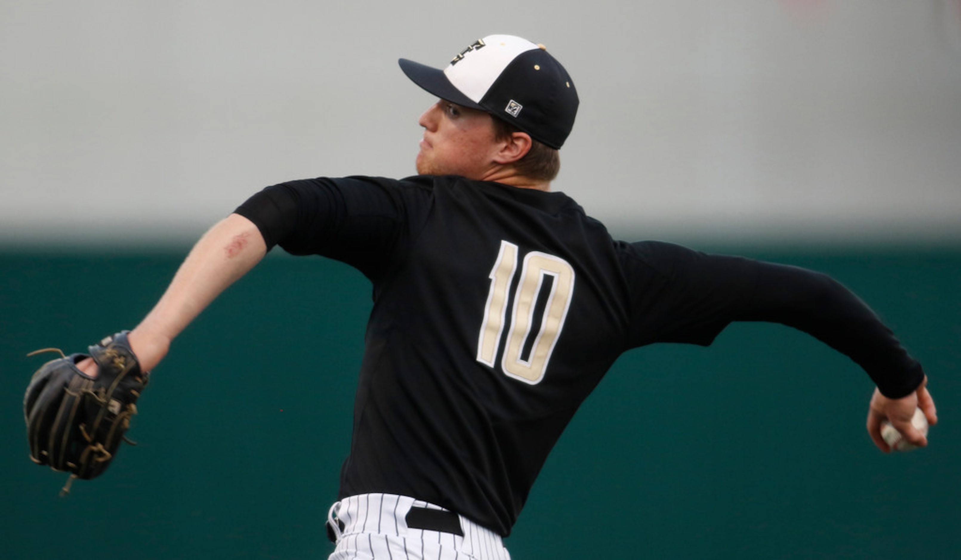 The Colony pitcher Ryan Scott (10) delivers a pitch to a Rockwall Heath batter during the...