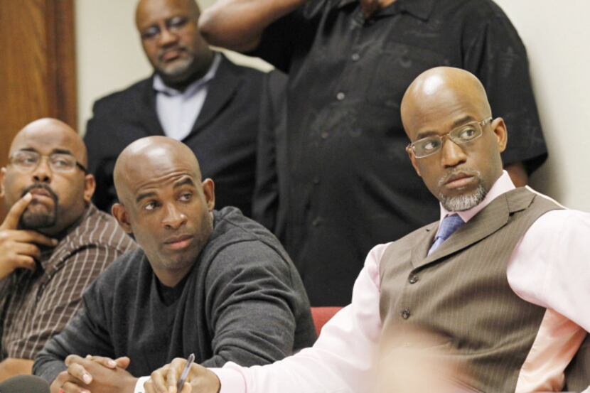 Deion Sanders (left) and D.L. Wallace founded Prime Prep together but have clashed over...