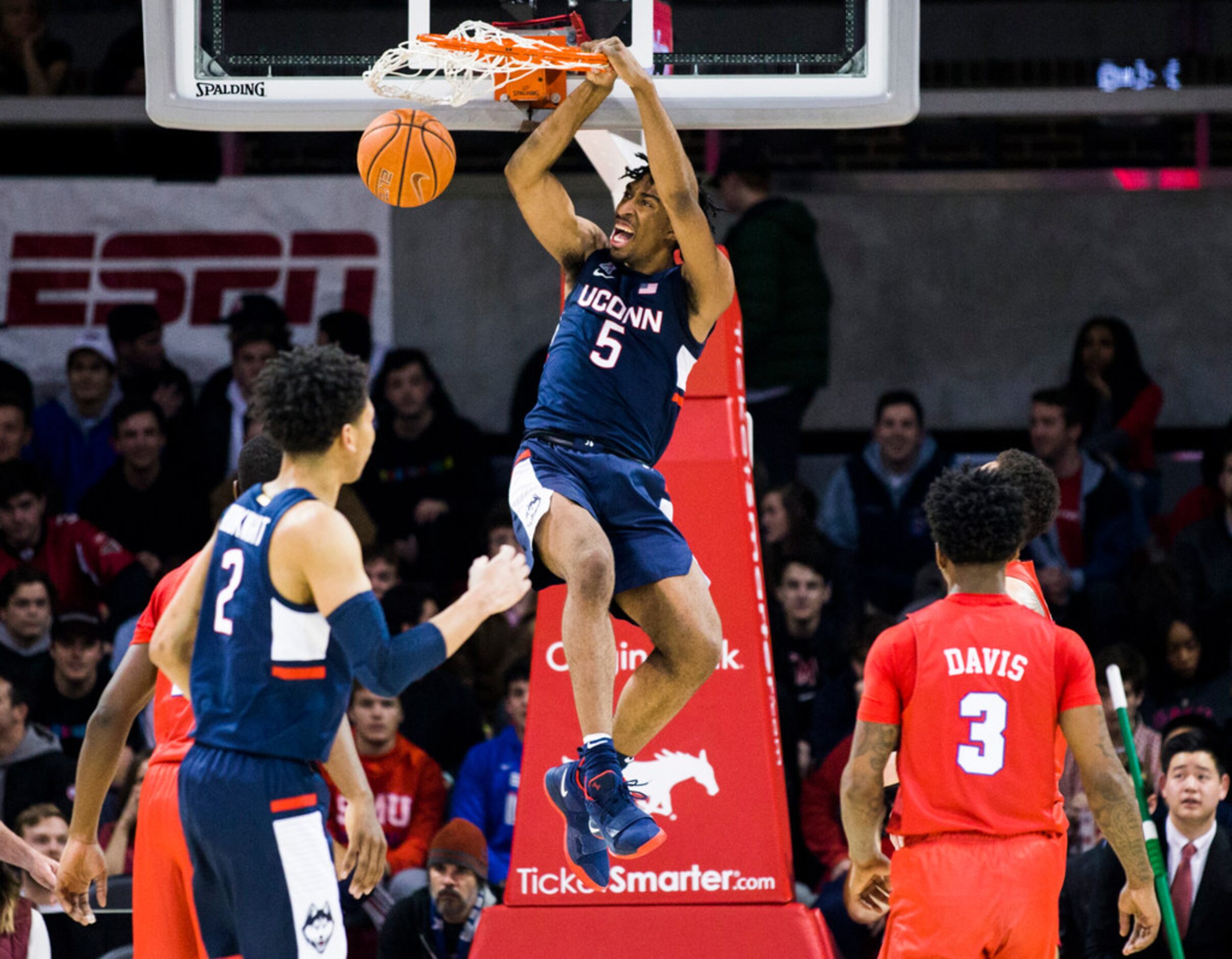 Connecticut forward Isaiah Whaley (5) dunks the ball during the first half of an NCAA...