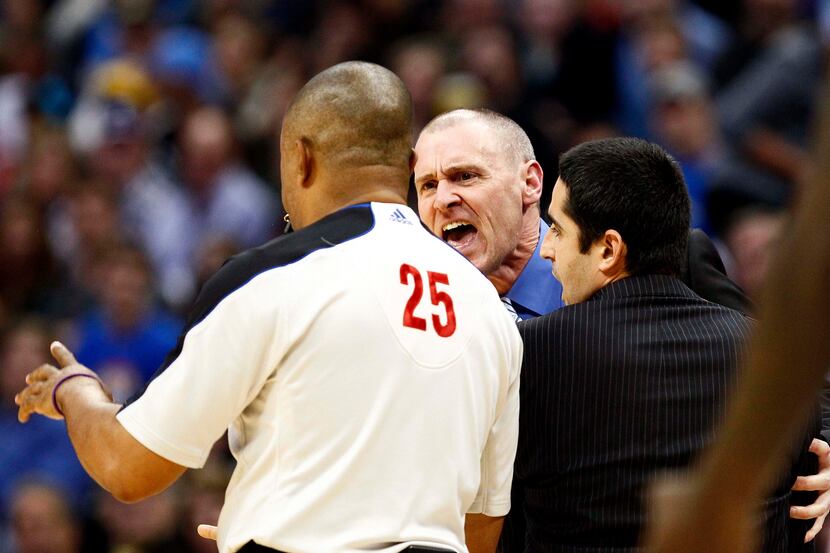 Nov 23, 2013; Denver, CO, USA; Dallas Mavericks head coach Rick Carlisle argues with referee...