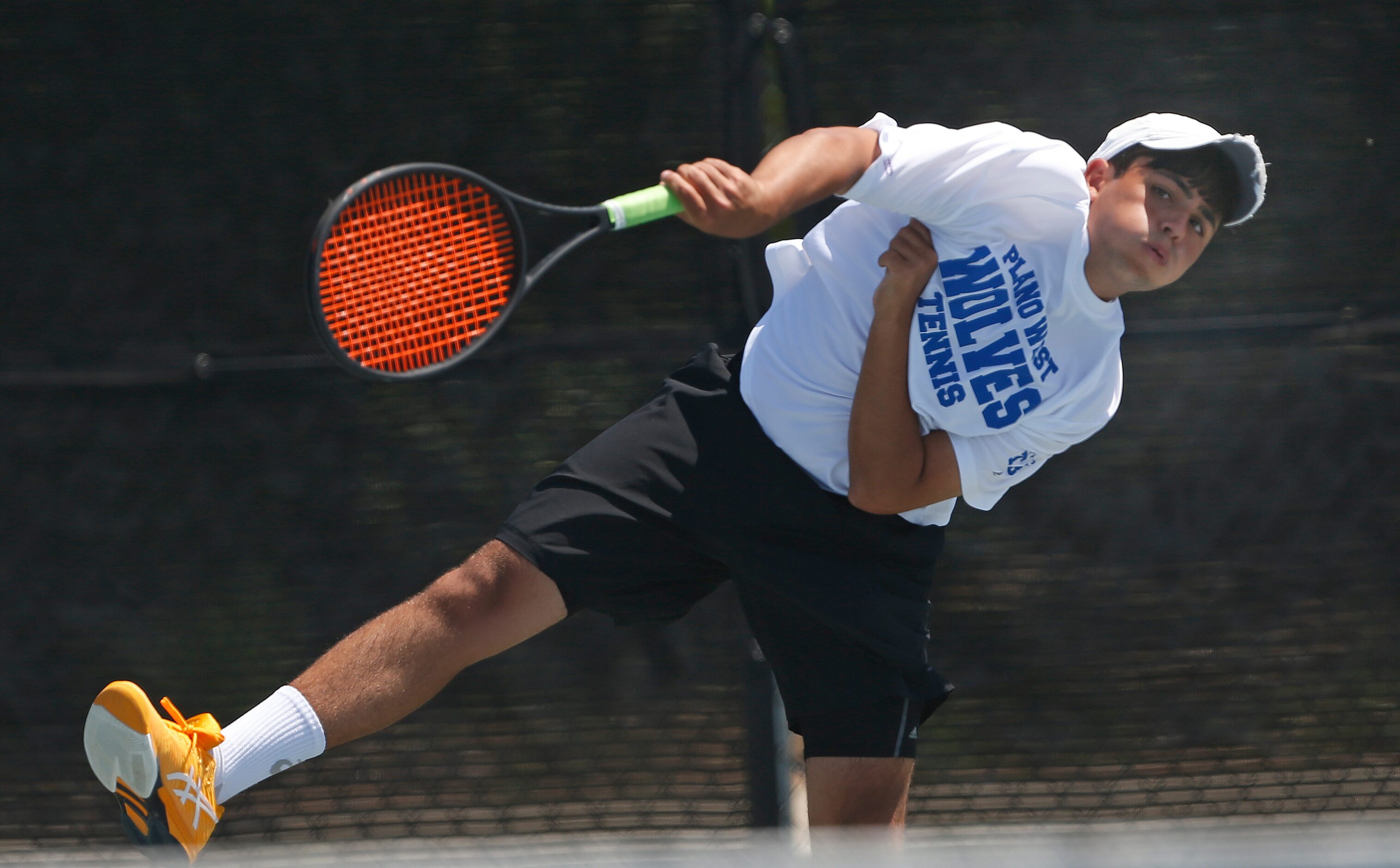 In a 6A boys doubles match, Plano West's Kishan Kersten makes a return. UIL state tennis...