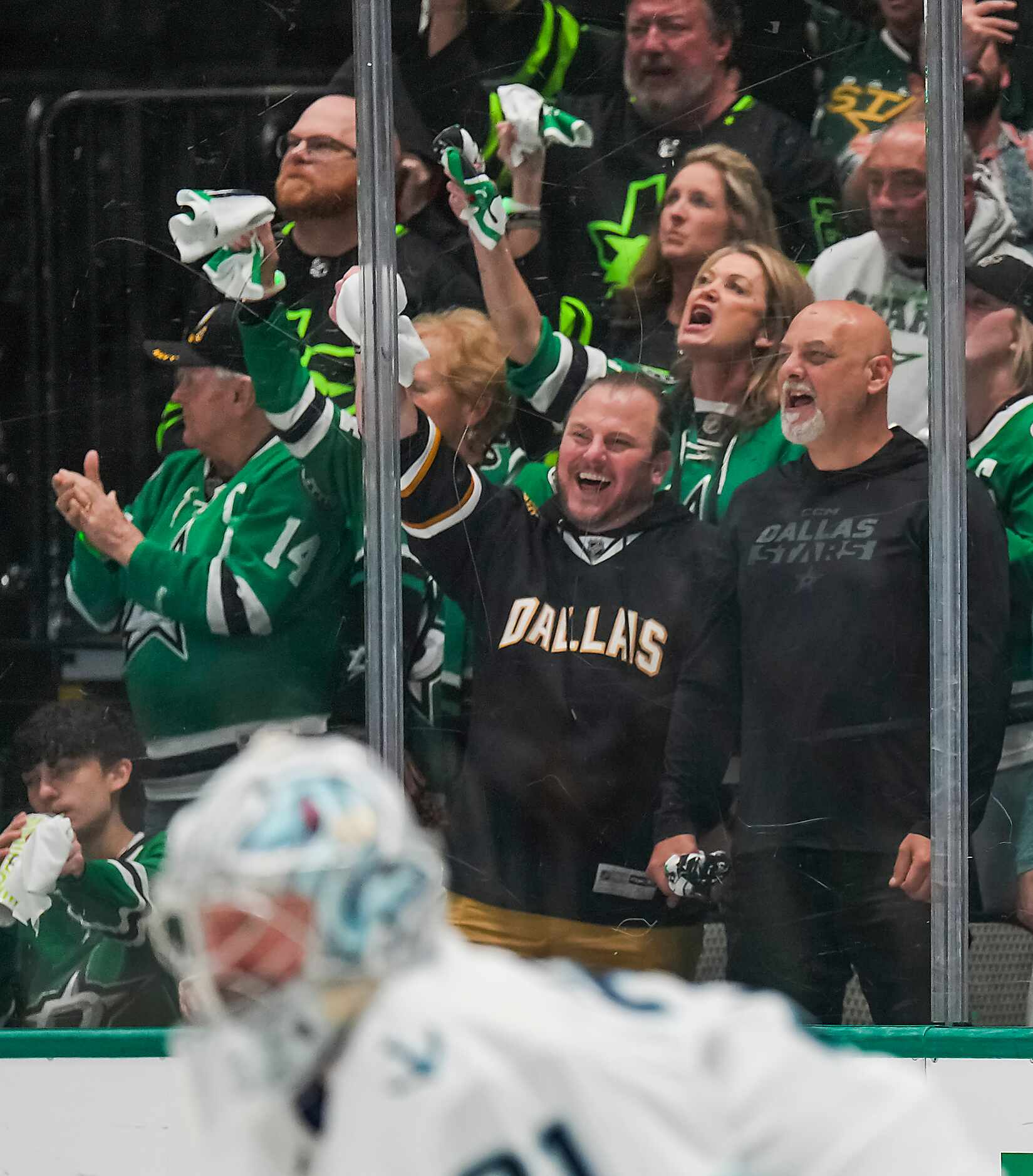 Dallas Stars fans celebrate a goal by center Roope Hintz during the first period in Game 5...