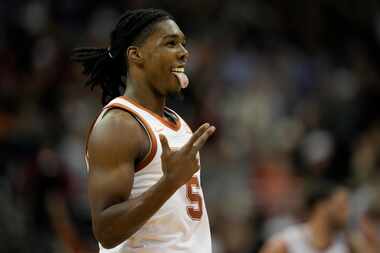 Texas guard Marcus Carr celebrates after scoring against Xavier in the first half of a Sweet...