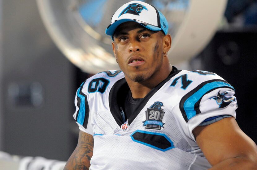 FILE - In this Friday, Aug. 8, 2014 file photo, Carolina Panthers defensive end Greg Hardy...