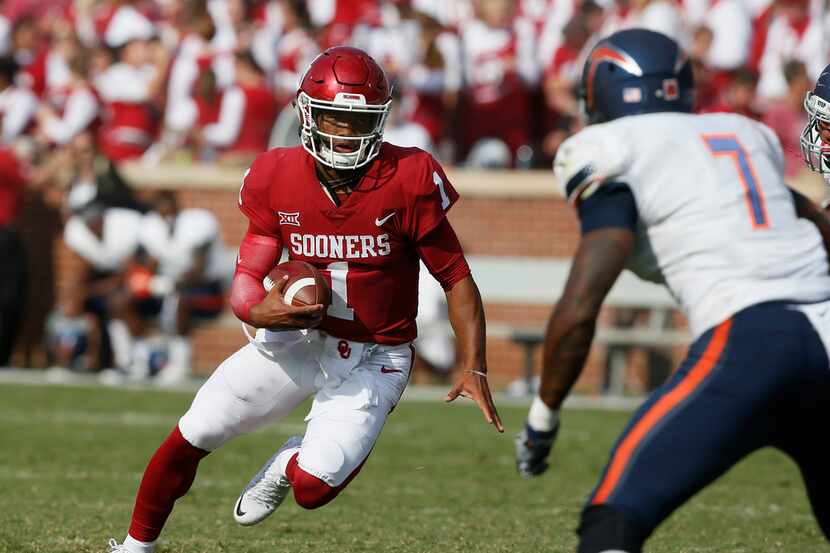 Oklahoma quarterback Kyler Murray (1) carries past UTEP linebacker Kalaii Griffin (7) during...