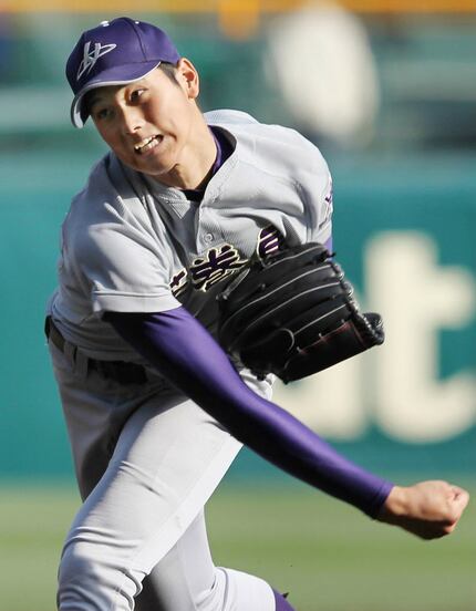 NISHINOMIYA, Japan - Farsad Darvish (L) and his wife Ikuyo (R), parents of  Tohoku High School ace Yu Darvish, who would later become pro club Nippon  Ham Fighter pitcher, root for their