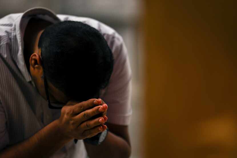 A worshipper prays at the Karya Siddhi Hanuman Temple in Frisco, Texas, Saturday, Oct. 22,...