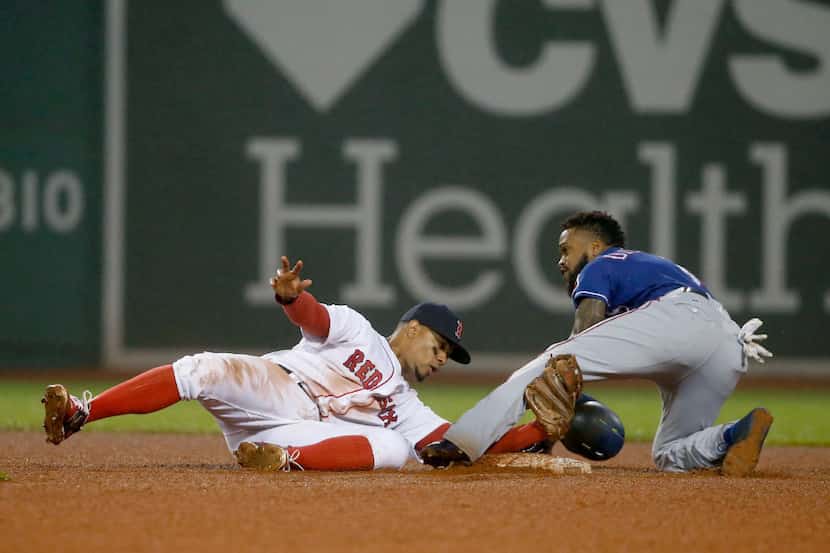 Texas Rangers' Delino DeShields steals second base ahead of the tag from Boston Red Sox...