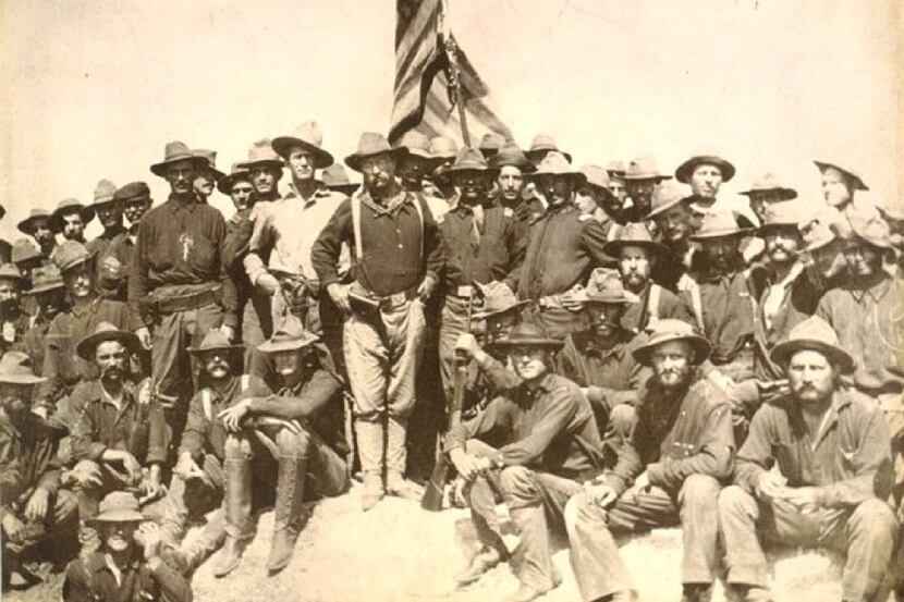 Col. Theodore Roosevelt and his Rough Riders at the top of the hill they captured  in  the...