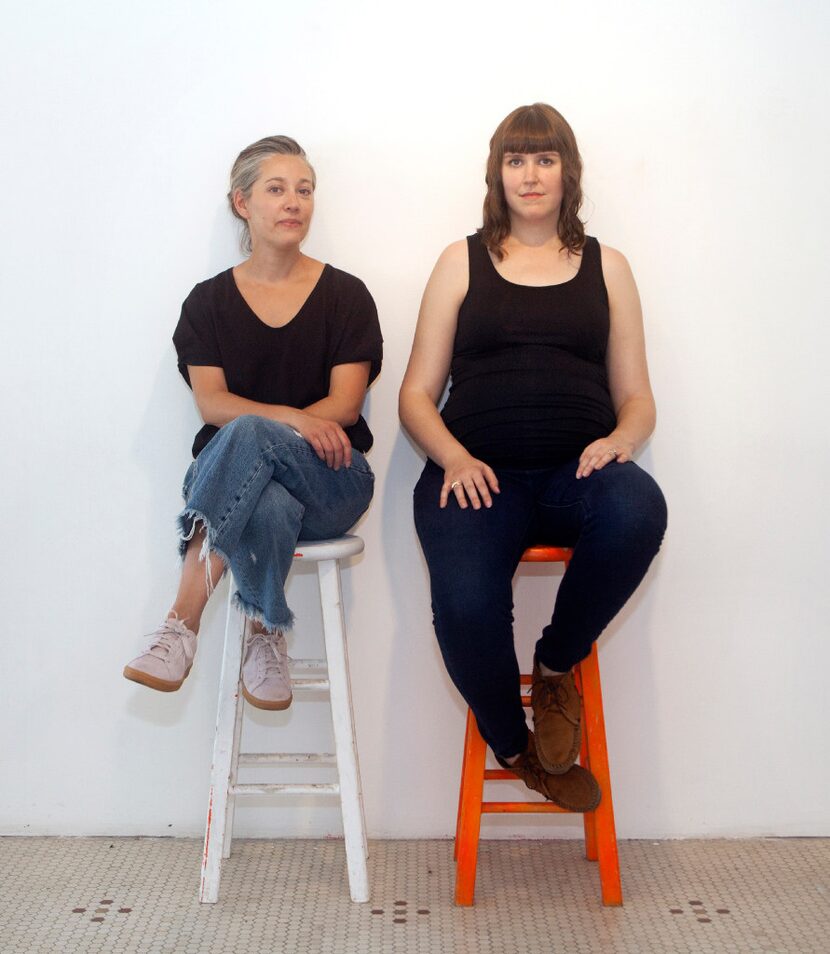 Artists Lucia Simek (left) and Cassandra Emswiler Burd photographed at their installation ...