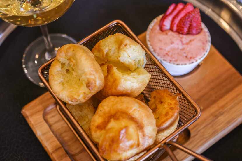 Miniature popovers with strawberry and Texas honey compound butter by Herd and Hearth on...