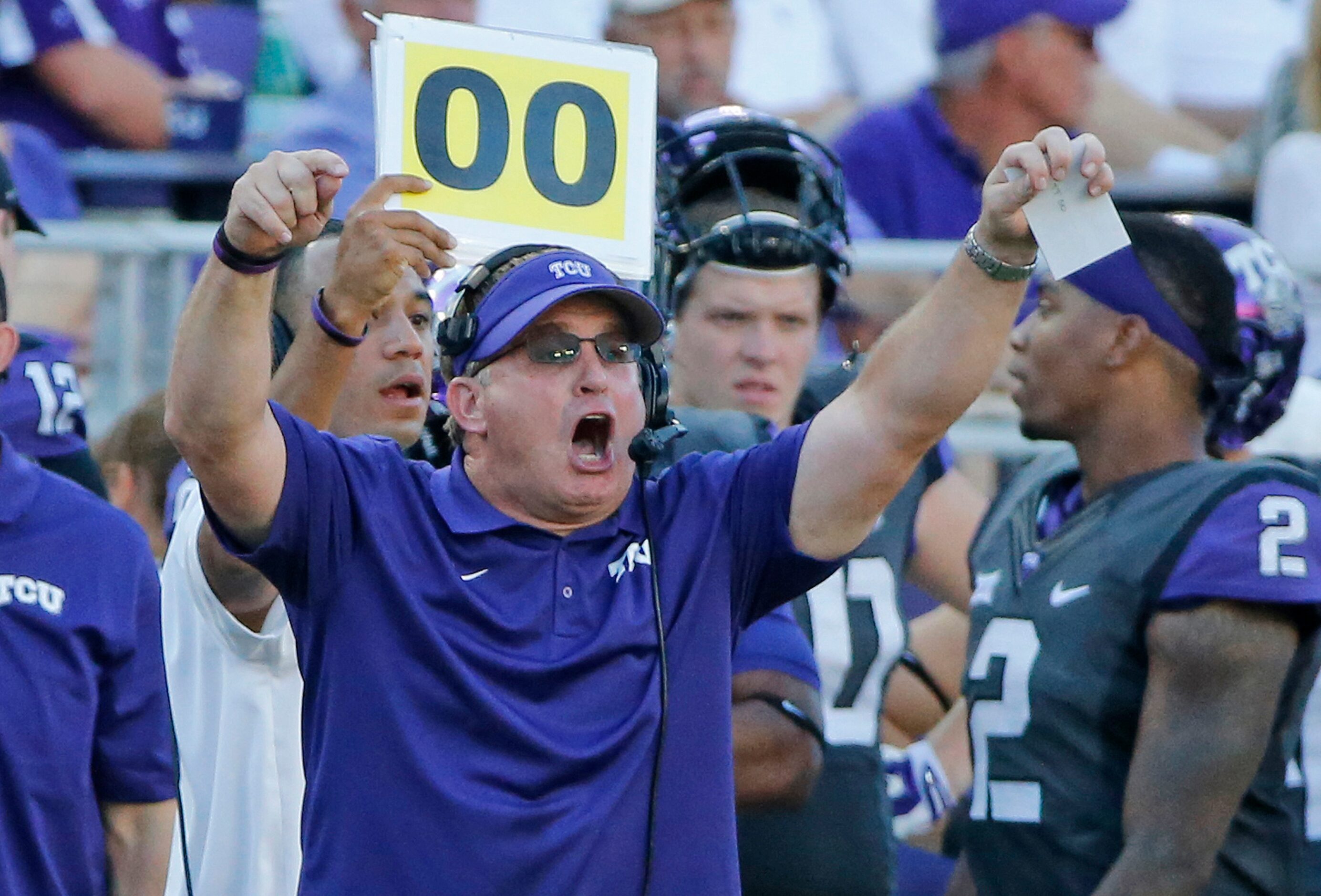 TCU head coach Gary Patterson urges his team on in the third quarter during the Texas Tech...