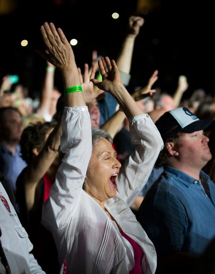 Fans cheer as The Rolling Stones take the stage at AT&T Stadium.