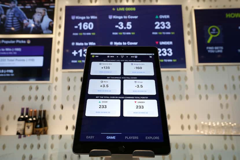FILE - In this March 19, 2019, file photo, an iPad displays the types of free bets that...