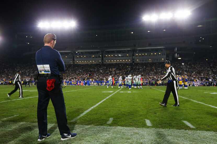 Dallas Cowboys head coach Jason Garrett paces the sidelines during the final moments of a...