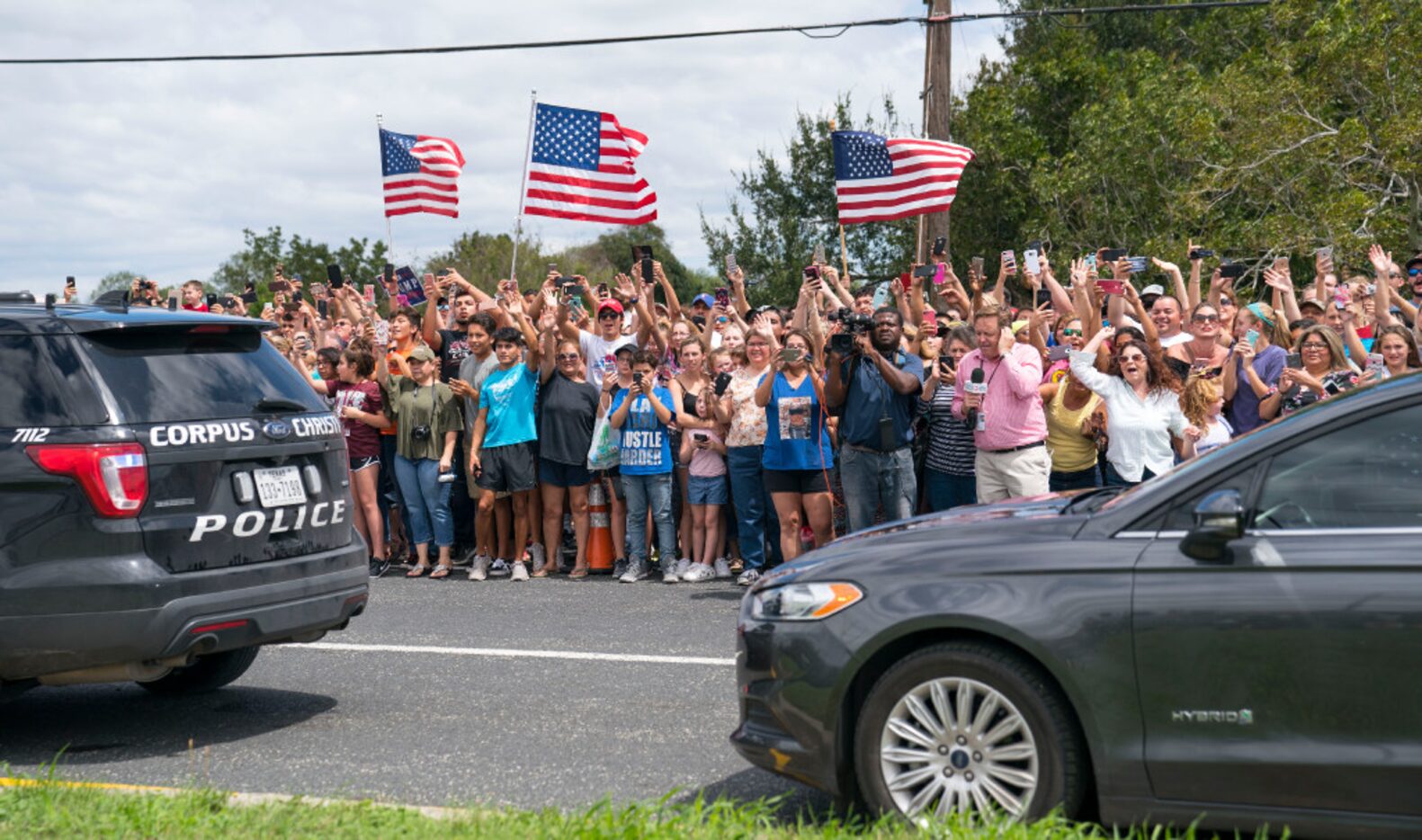 Supporters outside a fire station where President Donald Trump participated in a briefing on...