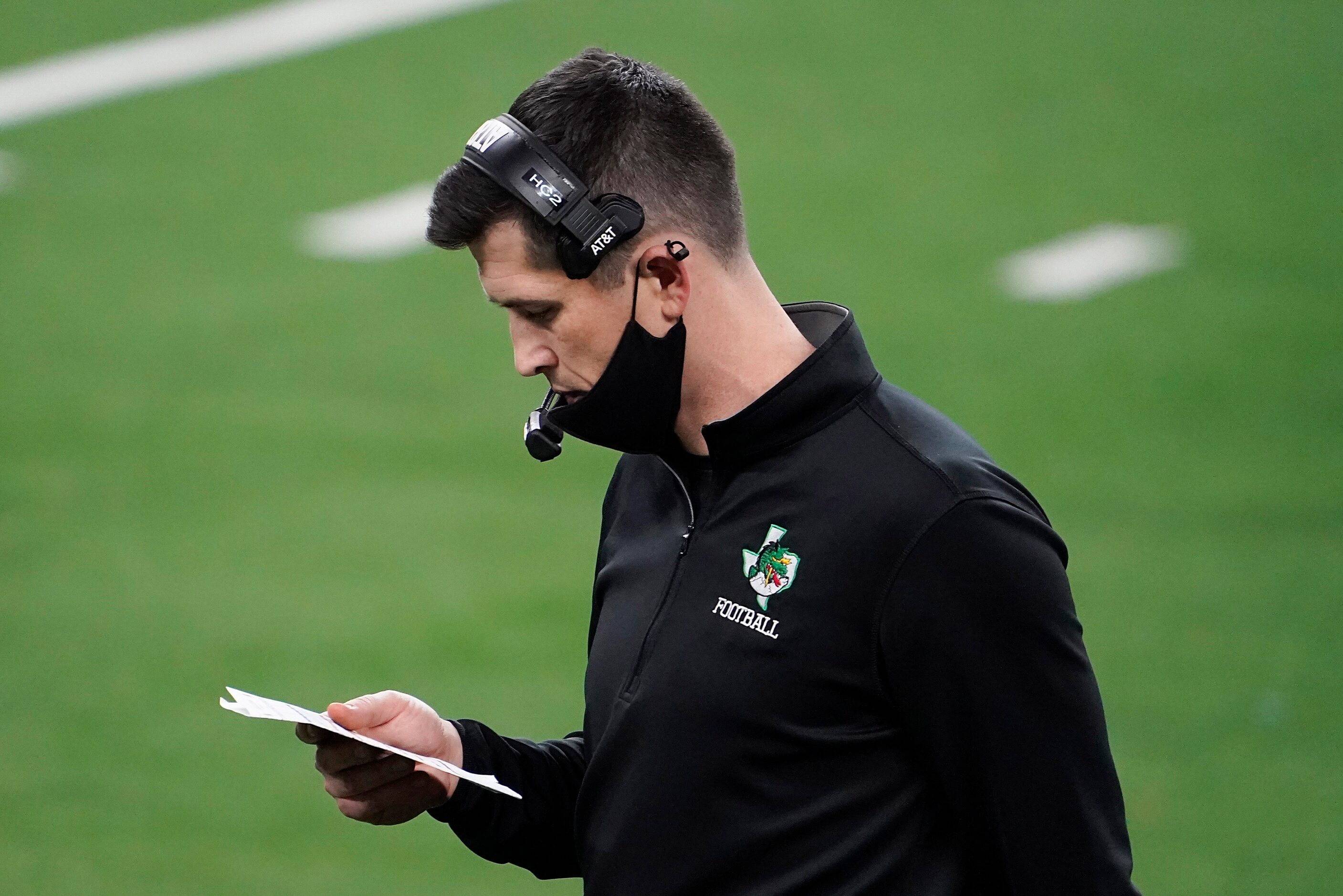 Southlake Carroll head coach Riley Dodge works on the sidelines during the fourth quarter of...