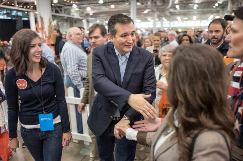  Sen. Ted Cruz, greeting supporters at the Iowa State Fair in August, is surging in Iowa...