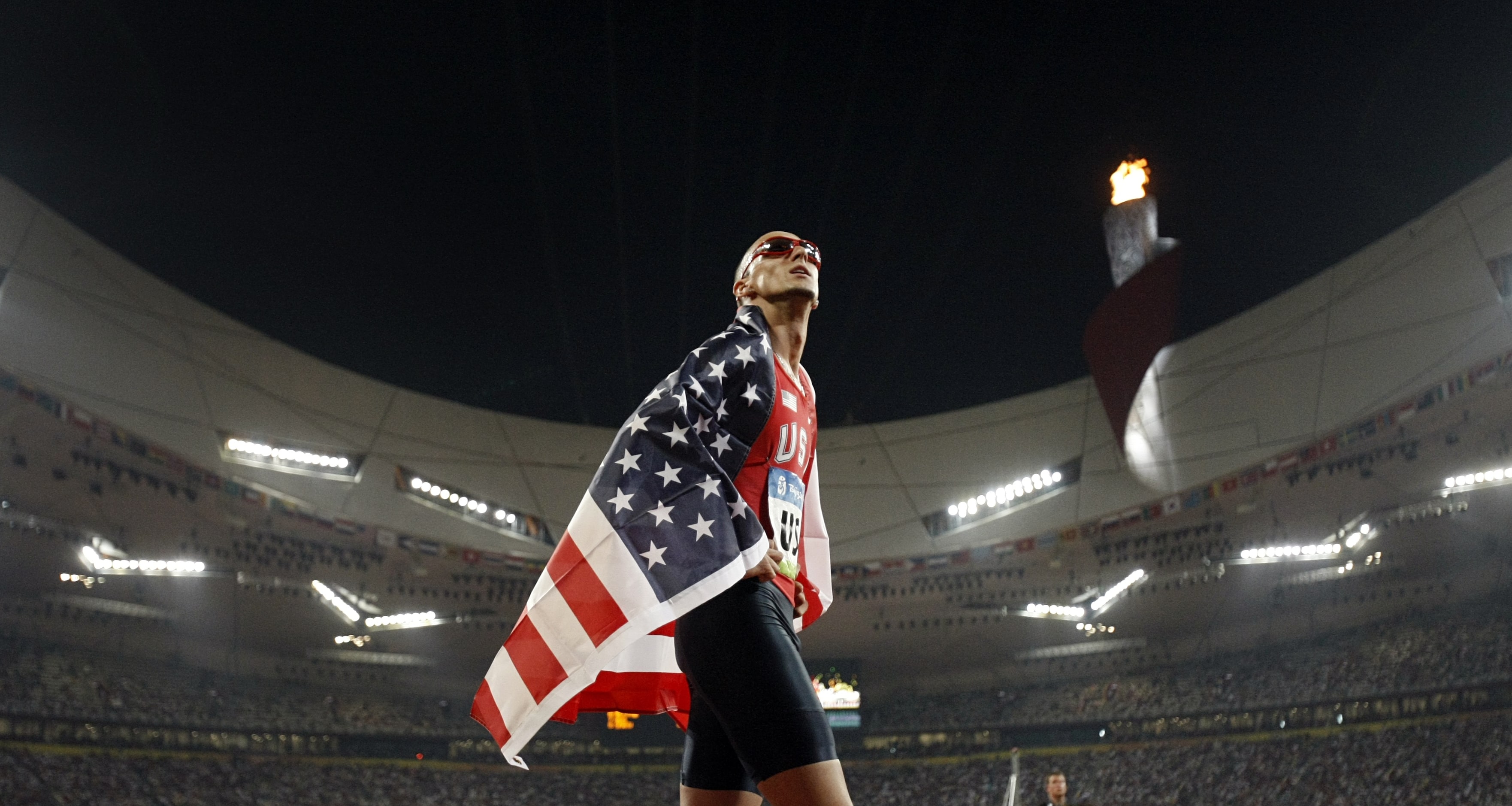 From 2008: U.S. Men's 4x400M Relay team member Jeremy Wariner watches the replay of his race...