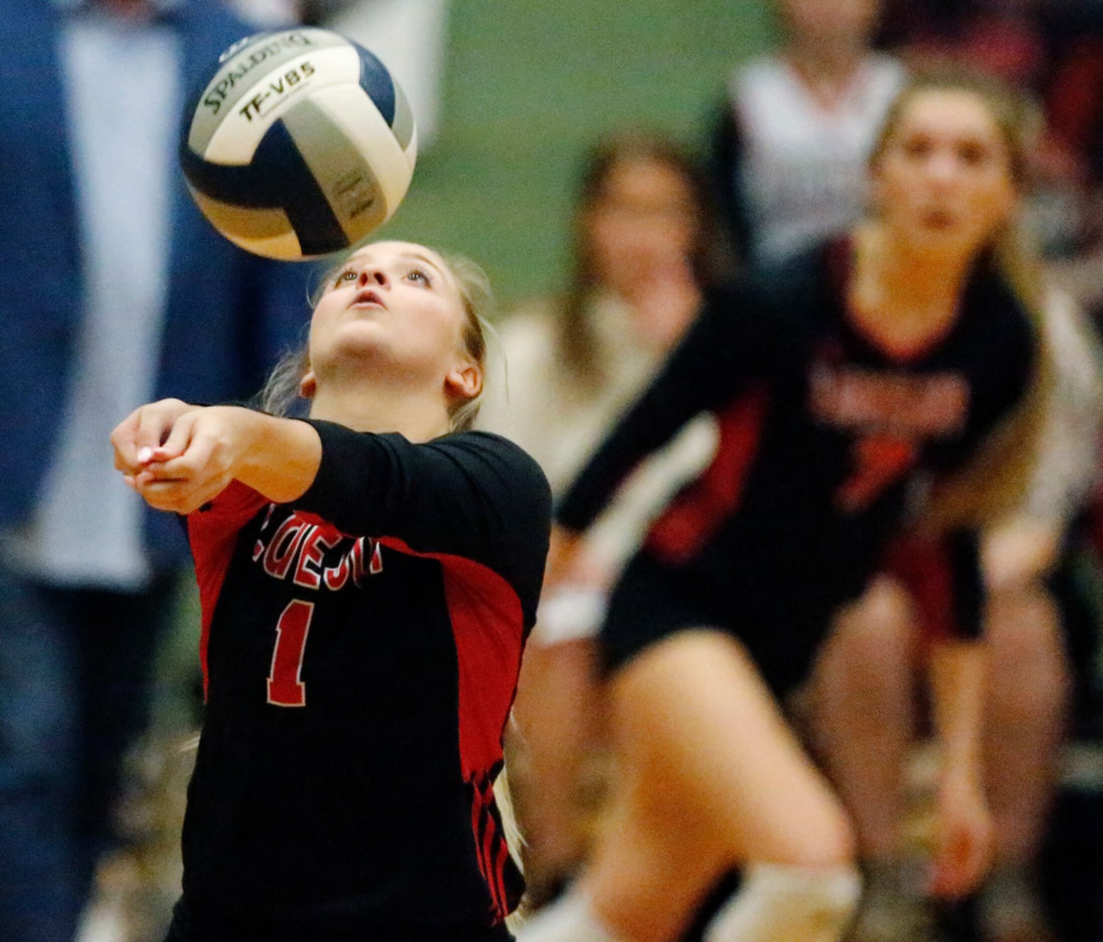 Lovejoy High School defensive specialist Mckenna Franks (1) passes the ball in game one as...