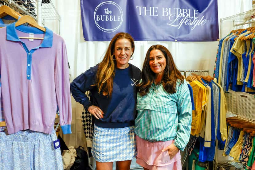 The Bubble Lifestyle owners Brett Oliver (left) and Darbie Brown stand at their booth during...