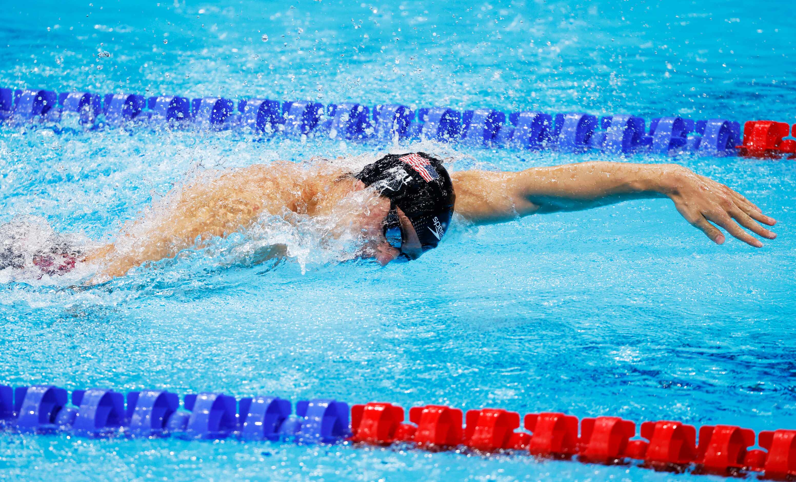 USA’s Zach Apple competes in the men’s 4x100 meter medley relay final during the postponed...