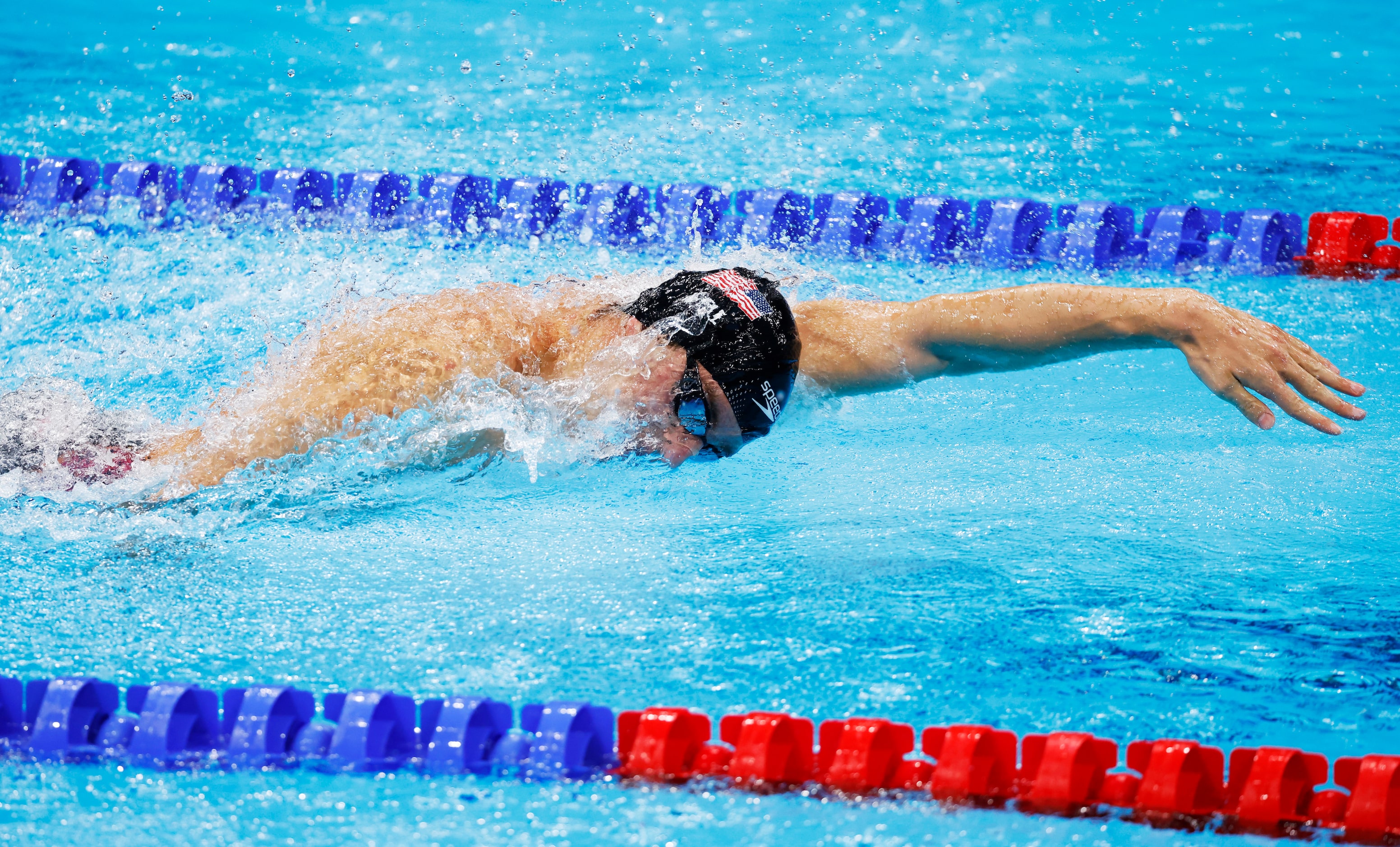 USA’s Zach Apple competes in the men’s 4x100 meter medley relay final during the postponed...