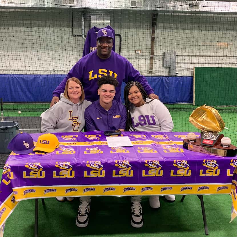 Ian Moller, center, originally signed with LSU to play collegiate baseball. He's pictured...