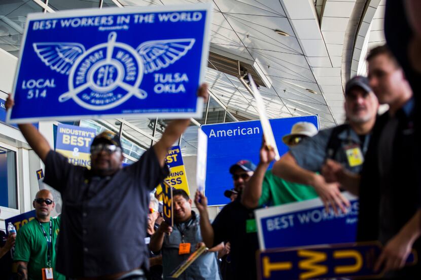 Union workers, such as these American Airlines baggage carriers protesting last year at DFW...