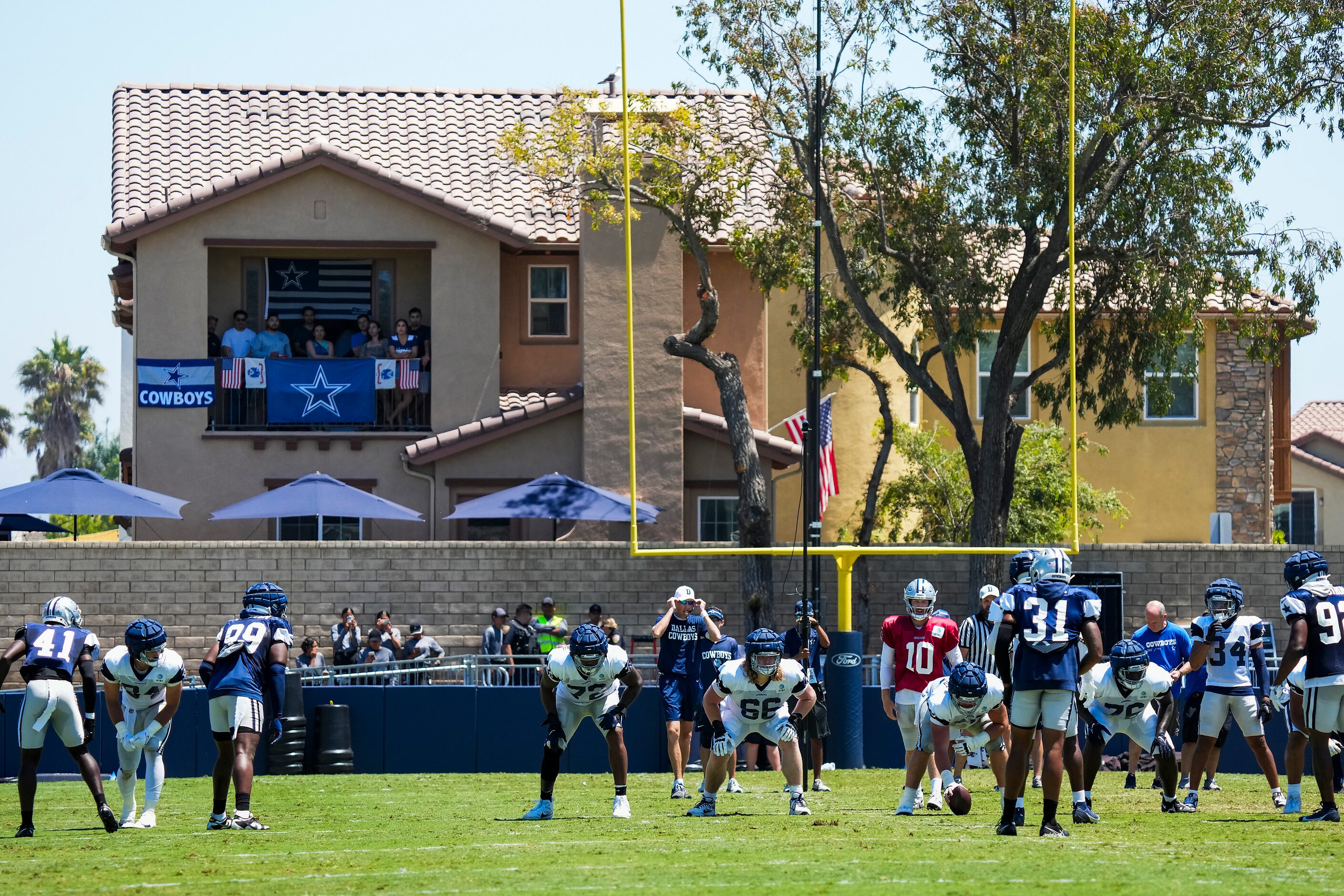 Dallas Cowboys quarterback Cooper Rush (10) brings the offense to the line of scrimmage...