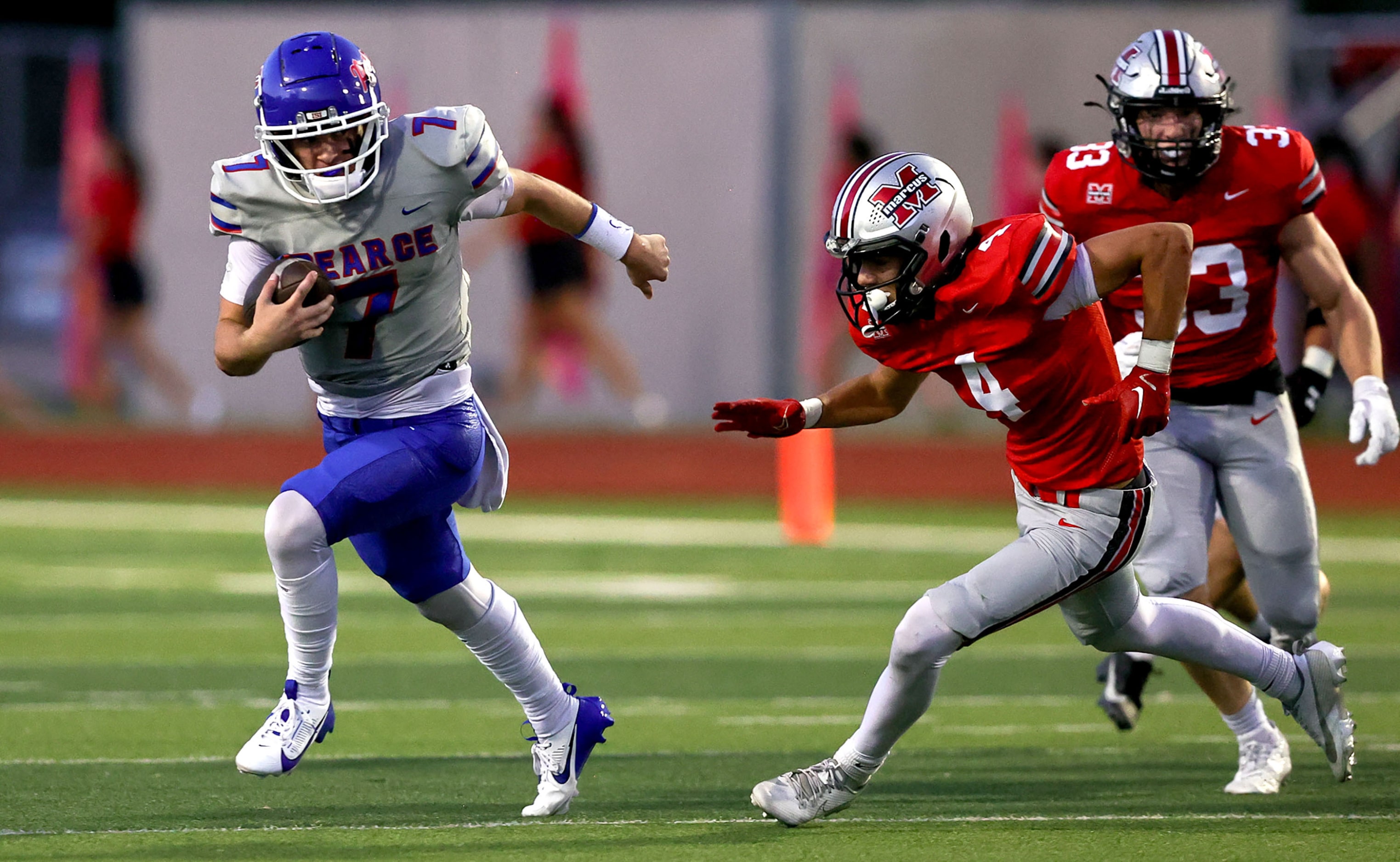 Richardson Pearce quarterback Presley Harper (7) tries to scramble pass Flower Mound Marcus...